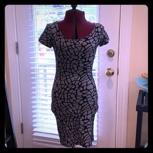 Soprano cross back body con dress